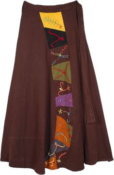 An utterly bohemian skirt in a distinctive brown color that stands out beautifully; the hand crafted palette of warm colored blocks each depicting different abstract grasses sewed into the fabric, it bespeaks both fall and harvest.  Made from pure heavyweight knit jersey cotton which adds to stretch and movement with the skirt. #tlb #WrapAroundSkirt #Stonewash #XLPlus #Fall #bohemianfashion #Handmade #XXLskirtforfall #XXLlongwrapskirt #brownlongwrapskirt Bohemian Brown Skirt For Fall, Fall Bohemian Brown Skirt, Brown Cotton Long Skirt, Long Brown Cotton Skirt, Brown Patchwork Skirt For Fall, Fall Patchwork Brown Skirt, Bohemian Brown Cotton Skirt, Traditional Long Brown Skirt, Brown Long Cotton Skirt