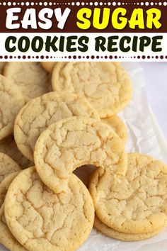 easy sugar cookies recipe on a plate with the title in the middle and bottom right corner