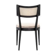 a black and white chair with a cushion on top of it's back end