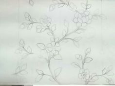 a drawing of some flowers on a sheet of paper