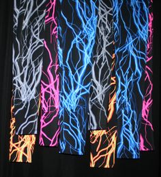 LIGHTNING BOLT / STORM LONG SLEEVE TOP Awesome Fabric - Glows Under Blacklight!! 5 Dazzling Colors!! Matching Leggings and Shorts Also Available! CUSTOM REQUESTS: All items can be adjusted to your needs!! → Waist higher/lower, inseam longer/shorter, different fabric, style or color → If you need help with sizing, send me a message with your measurements: Bust / Waist / Hips / Girth → We custom make many different styles in all sizes!! * Toddler, Child, Women, Men, Plus Size * Shorts, Tops, Leggi Lightning Leggings, Yoga Roller, Storm Lightning, Glow Party, Matching Leggings, Womens Leggings, Roller Derby, Best Leggings, Lightning Bolt