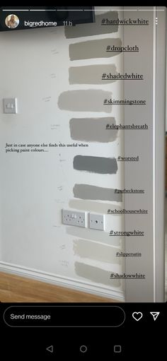 the wall is painted with different shades of gray