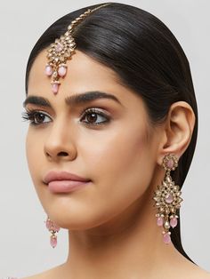 Beautiful kundan earrings with stones and pearls, plus matching mang tikka Traditional Indian Jewelry: Slight Color variations are possible due to lighting and photography. If you are interested in purchasing this item and have any additional questions about this item, please feel free to email us at nazranaanj@gmail.com. For faster responses, call us at 732-283-1808 or WhatsApp us at 609-852-9922 Care instructionsKeep Jewelry away from direct heat, water, perfumes, deodorants and other strong - Pink Kundan Chandelier Earrings, Elegant Pink Kundan Chandelier Earrings, Pink Stone Work Tikka As Gift, Festive Pink Hand Set Bridal Earrings, Jeweled Danglers For Wedding, Pink Stone Work Earrings For Wedding, Elegant Pink Jhumkas With Stone Work, Pink Stone Work Bridal Earrings For Wedding, Pink Stone Work Tikka For Wedding