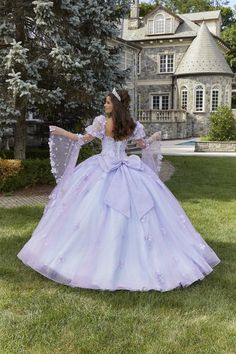 Twirl the night away in this fairytale quinceanera ball gown created by Morilee Valencia. 60174, has a draped, sweetheart bodice adorned with delicate crystal beaded, three-dimensional floral appliques that cascade down the glitter tulle skirt. Detachable princess sleeves and back bow complete the look! Dont miss out on this beauty for your special night! Sweet 16 Quinceanera Dress With Sweetheart Neckline, Purple Gown For Quinceanera With Sweetheart Neckline, Purple Gown With Sweetheart Neckline For Quinceanera, Fairytale Ball Gown For Quinceanera, Princess Style Quinceanera Dress With Fitted Bodice, Purple Tulle Quinceanera Dress With Fitted Bodice, Princess Quinceanera Dress With Sweetheart Neckline, Elegant Purple Quinceanera Dress, Princess Style Ball Gown With Fitted Bodice For Quinceanera