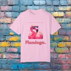 In a world of birbs.. i mean birds... be a Flamingo. Just be yourself! Made 100% with ring-spun cotton. The soft-washed, garment-dyed fabric brings extra coziness to your wardrobe while the relaxed fit makes it an excellent daily choice. The double-needle stitching throughout the tee makes it highly durable while the lack of side-seams helps the shirt retain its tubular shape.   Features pre-shrunk cotton for size retention and a signature sewn-in twill label. Made using 100% US cotton that is ethically grown and harvested. Flamingo T Shirt, Flamingo Tshirt, Casual Crew Neck T-shirt With Flamingo Print, Pink Flamingo Print Short Sleeve T-shirt, Casual Cotton T-shirt With Flamingo Print, Flamingo Shirt, Animal Graphic Tee, Animal Graphic, Just Be You