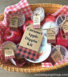 an apple dippin's kit in a wicker basket with tags on it