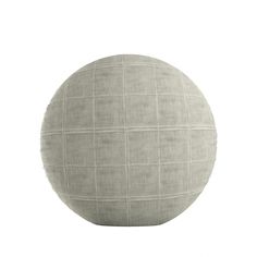 a large round cushion on a white background with grids in the center and bottom