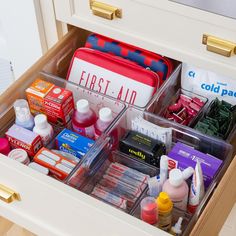 the drawers are filled with many different types of medicine and other medical care items in them