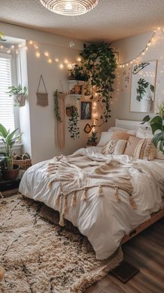 a bedroom with plants and lights on the wall above the bed in front of it