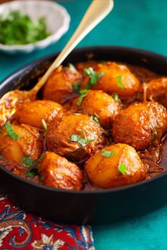 a close up of a pan of food on a table