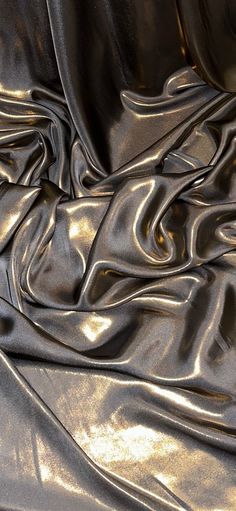 Our shimmer satin has a superior drape like no other. This luxurious fabric has a soft touch and glows beautifully creating a perfect blend between the shimmer and satin. Perfect for all types of dressmaking, crafting, decorating and various other projects.  *Colours may vary due to different screens.  *Width 58 inches *Synthetic *Machine Washable *If you order more than 1 meter, fabric will come as one continuous length. *Fast Delivery Before you go please check out our other items. We offer combined postage and special delivery. Lastly, we would appreciate if you can leave us feedback once items are received. Thank you. Fabric Close Up, Metallic Fabric Texture, Satin Fabric Texture, Fabrics Texture, Elegant Fabrics, Aesthetic Fabric, Fabric Moodboard, Gold Abstract Wallpaper, Sheer Texture