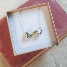 Our 'once upon a time' connector charm is hung on an 18 inch silver chain. A beautiful whimsical gift for any fairytale fan! It arrives boxed as shown. We can include a personal note if you are sending straight to the recipient. Our boxes are recyclable and made of recycled materials.  We have various matching items in our store if you would like earrings or a bracelet to match - this would go brilliantly with our book earrings.  Thank you for visiting! Ammonite Jewelry, Time Necklace, Fairy Tale Jewelry, Alpaca Gifts, Prince Caspian, Book Earrings, Whimsical Gifts, Gifts For Farmers, Book Jewelry