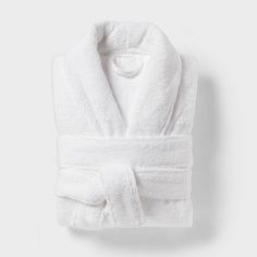 Make every day feel like a spa day by wrapping yourself in this Spa Plush Bath Robe from Threshold™. Crafted from 100% terry cotton and featuring a plush design, this V-neck bathrobe feels soft against your skin as you bundle up after a shower. Designed in a solid white hue, it features an open-front design with a shawl collar for easy on and off. A front tie with belt loops offers you a customizable fit, while two large front pockets come in handy for keeping your phone or grooming essentials c Terry Cloth Bathrobe, Black Flower Dress, Plush Design, Target Gifts, One Piece Clothing, One Piece Pajamas, Sewing Party, Men's Knit, Spa Day