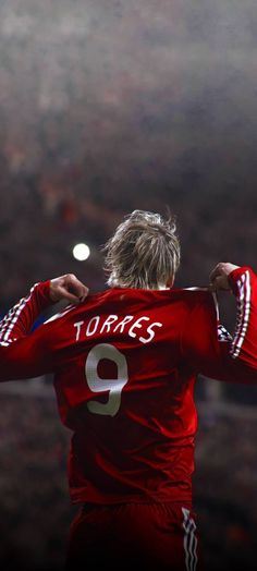 the back of a soccer player's red jersey