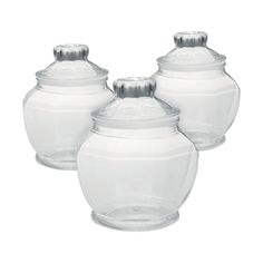 three clear glass jars with lids