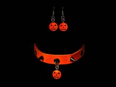 The Sweet Jack Chokers come in two styles. The first is an orange choker with black cone spikes and black eyelets with a pumpkin charm.The second is a black choker with orange tree spikes and eyelets, with a pumpkin charm.  These two styles go perfectly with the matching Sweet Jack Earrings which are available in regular hook, or clasp back.   Both pieces are available in average and plus sizing, with an adjustable chain in the back. So you'll always have the perfect fit Orange Choker, Scene Goth, Orange Tree, Black Choker, Emo Scene, Pittsburgh Pa, Choker Necklaces, A Pumpkin, The Sweet