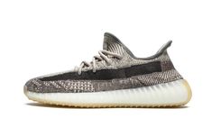 The adidas Yeezy Boost 350 V2 “Zyon” is a Summer 2020 release that continues the model’s association with wearable, neutral-toned colorways.  The Primeknit upper takes on a marbled black, white, and grey look that can sync up with just about any outfit thrown its way.  A solid black woven side stripe spans from heel to toe to contrast the appearance.  Beige cotton laces and a grey liner provide additional styling.  The “Zyon” colorway omits the heel tab found on many previous iterations of the Y Yeezy Collection, 350 Boost, Baskets Adidas, Adidas Boost, Exclusive Sneakers, Yeezy Boost 350 V2, Nike Dunk High, Yeezy 350, Air Jordan 3