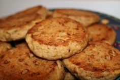 some biscuits are stacked on top of each other in a blue plate and ready to be eaten