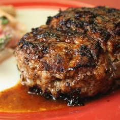 a close up of a plate of food with meat