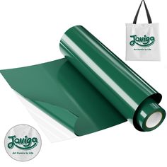 a roll of green wrapping paper next to a bag with the company logo on it