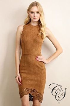 Stand out of the crowd during the party season wearing this beaut midi dress, in a camel faux suede fabric. Team with a pair of killer heels and statement earrings for a weekend worthy look. Model is wearing a medium Fabric: 96% Polyester 4% Spandex Hand wash cold, line dry. Do not bleach, iron or dry clean. Size Chart Suede Dress Winter, Laser Cut Dress, Thanksgiving Dress, Brown Fits, Geometric Dress, Faux Suede Fabric, Cut Dress, Dress Winter, Killer Heels