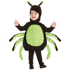 a little boy in a costume that looks like a spider