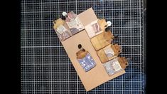 an overhead view of a piece of cardboard with various items on it