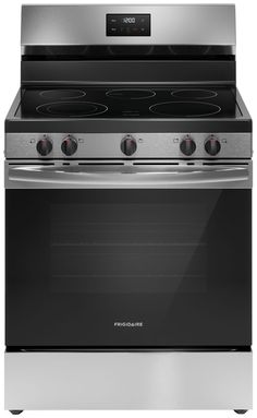 an oven with the door open and two burners on each side, in stainless steel