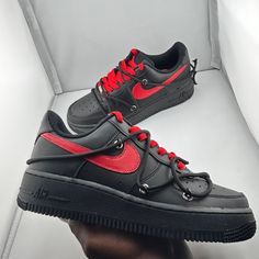 Custom red and black  Rope Laced, Red Bottoms Air Force Ones  Available in Men's and Women's sizing! Made with high quality acrylic paint  Base shoe: All Black Nike Air Force One This custom shoe is perfect for anyone who wants to stand out from the crowd. It features black rope laces and red bottoms, creating a striking contrast against the classic black Air Force 1 base. Urban Red Custom Sneakers For Streetwear, Red Urban Custom Sneakers For Streetwear, Urban Red Custom Sneakers With Red Sole, Urban Custom Red Sneakers With Red Sole, Red Lace-up Custom Sneakers For Streetwear, Dickies Outfit, Black Air Force 1, All Black Nikes, Custom Af1