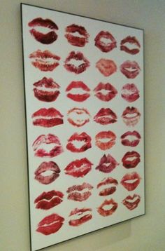 an image of lipstick kisses on the wall