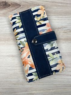 Get organized in style with our Ivy Wallet PDF Pattern! This slim wallet features 2 slip pockets that can hold cash, a checkbook, or even your phone. Plus, with 10 card slots and a zipper pocket for change, you'll have plenty of room for all your essentials. Don't settle for a boring wallet - make your own with our pattern today! *This is a digital product, no physical product will be sent.* *Due to the digital nature of this product, no refunds will be issued.* You are welcome to sell items you Wallet Sewing Pattern, Sew Wallet, Sewing Projects Free, Handcrafted Bags, Wallet Pattern, Don't Settle, Bag Patterns To Sew, Digital Nature, Slim Wallet