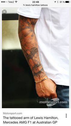 a man with a tattoo on his arm