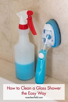 a blue and white toothbrush sitting next to a bottle of soap on top of a sink