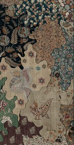 an area rug with many different colors and designs on the carpet, including leaves and flowers