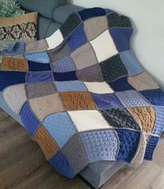 a couch with a blanket on top of it