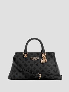 Faux-leather signature satchel Allover peony print Shiny gold-tone hardware Front logo emblem Multiple interior pockets Zip-top closure Top handles with 4" drop. Detachable shoulder strap with 22.75" drop. 13.25"W x 7"H x 3.5"D Guess Hand Bag Black, Guess Purse, Candle Pedestal, Guess Purses, Peony Print, Logo Emblem, Emblem Logo, 7 H, Zip Top