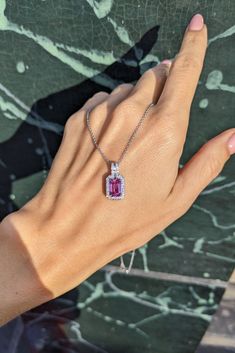 Step into a world of aesthetic brilliance with this 1.91 ct. Emerald Cut Pink Sapphire Pendant, a masterpiece crafted in 18K white gold that embodies the essence of fine jewelry. This bespoke design draws from the latest jewelry trends of 2024, combining a chic, modern appeal with the timeless allure of a fairytale gemstone. Perfect as a memorable Christmas gift or a unique choice for Thanksgiving and wedding jewelry, this "celebrity pendant" exudes an elegance fit for royalty. Whether adorning yourself or gifting a loved one, the Princess Pendant captures a blend of modern sophistication and classic beauty, making it an unforgettable piece in any jewelry collection. Classic Beauty