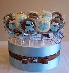 a blue box filled with cookies on top of a table