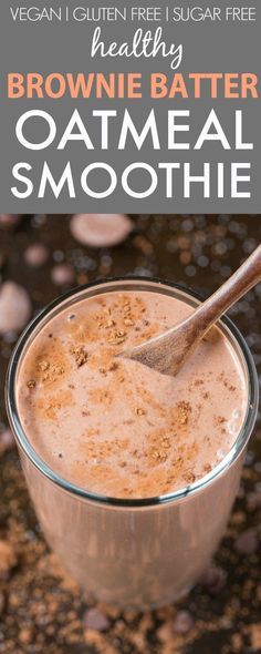 a glass bowl filled with oatmeal smoothie on top of a table