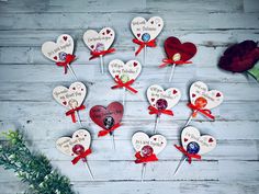 valentine's day lollipops are arranged in the shape of hearts