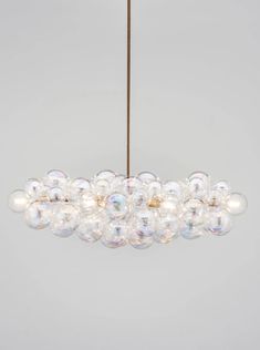 a chandelier with bubbles hanging from it