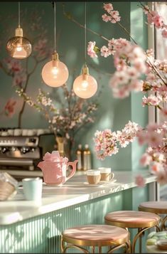 an image of a coffee shop setting with cherry blossoms on the wall and hanging lights