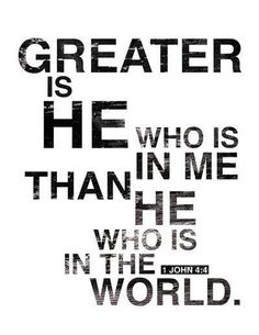 a black and white photo with the words greater is he who is in me he who is in the world