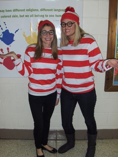 two women dressed in red and white striped sweaters