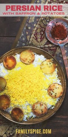 persian rice with saffron and potatoes served in a bowl on a wooden table