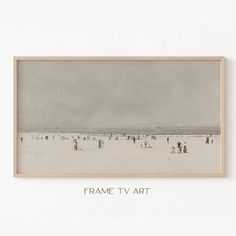 an old photo of people on the beach in black and white, with text frame tv art