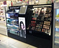 a display case in a store filled with cosmetics