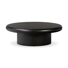 a black round table top on a white background