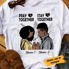 Get your product: Personalized Pray Stay Together Bwa Couple Christian T Shirt 1. PRODUCT INFORMATION:  Proudly printed in America 5.3 oz, unisex fit Heavy cotton, classic midweight fabric Material: 100% cotton | Dark Gray: 50% cotton:50% polyester | Light Gray: 90% cotton:10% polyester Double-needle stitched neckline, bottom hem, and sleeves Quarter-turned to eliminate center crease 7/8 inch collar Tear-away label Machine-wash safe Copyrighted artwork 2. SIZE CHART: 3. RETURN: We will gladly is Matching Clothes Couple, Praying Couple, Matching Clothes, Slogan Tshirt, Christian T Shirt, Son Of God