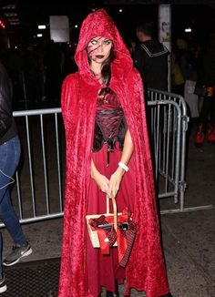 a woman dressed up as a red queen